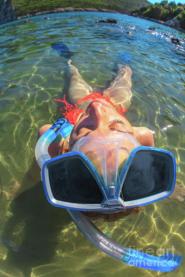 Female bikini snorkeler Photograph by Benny Marty