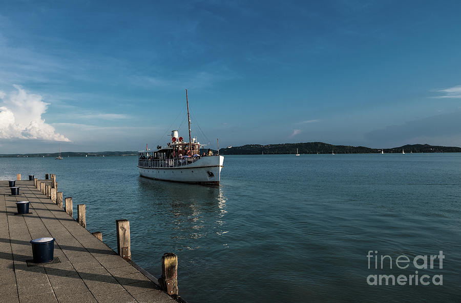 Ferry Ship approaches Harbor on Lake Balaton in Hungary Photograph by Andreas Berthold