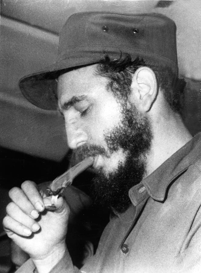 Fidel Castro, Lighting A Cigar, 1967 Photograph by Everett