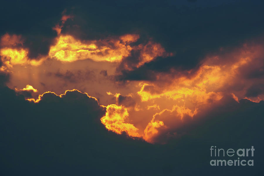 Fiery break in the dark clouds Photograph by Michal Boubin