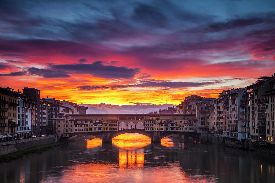 Fiery Sunrise over Ponte Vecchio Photograph by Andrew Soundarajan