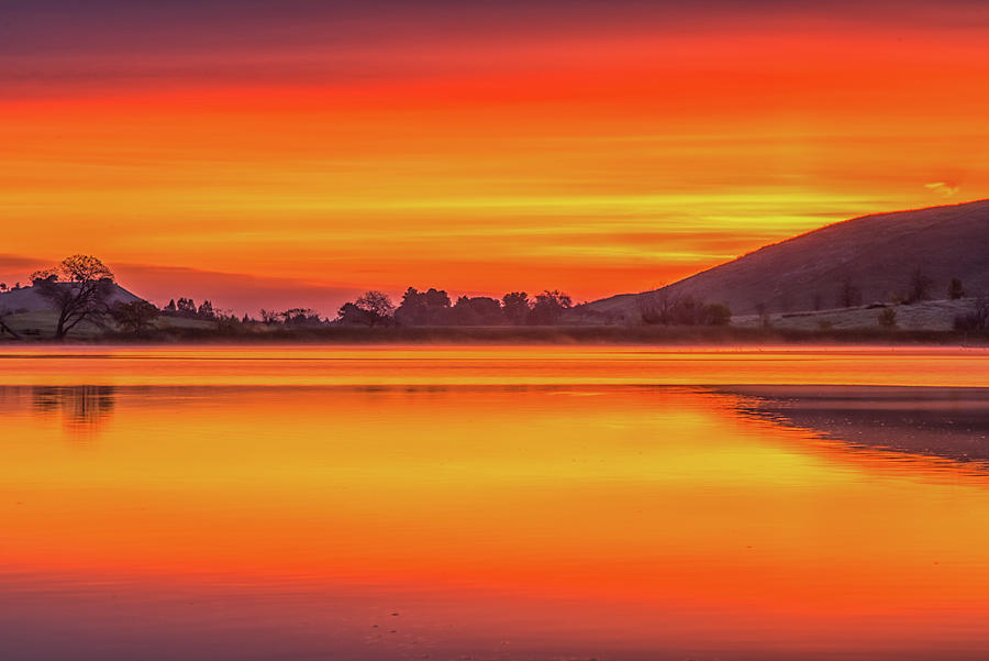 Fiery Sunrise Reflection Photograph