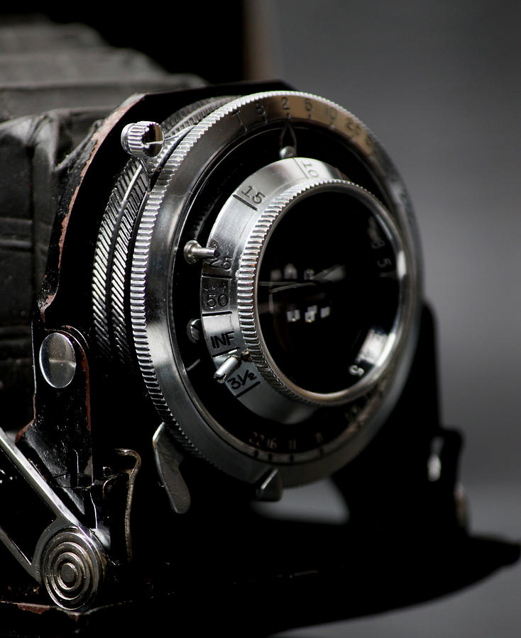 Vintage Photograph - Film camera in black by Kitty Ellis