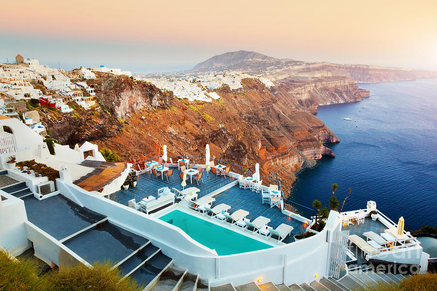 Fira the capital of Santorini island at sunset Photograph by Michal Bednarek