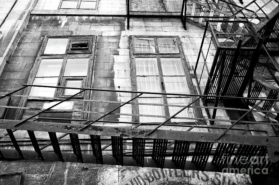 Fire Escape Angles in Montreal Photograph by John Rizzuto