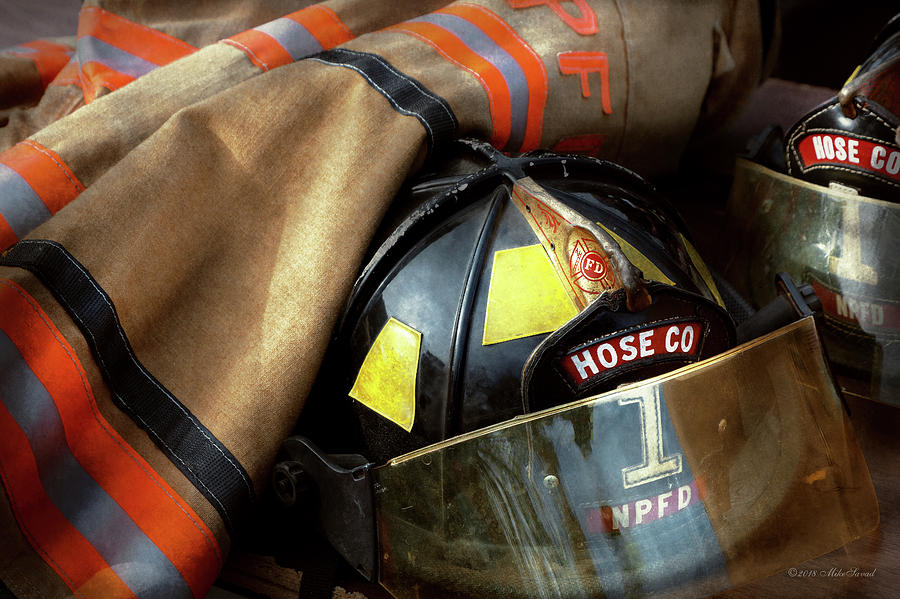 Fire Fighter - Hose company one Photograph by Mike Savad