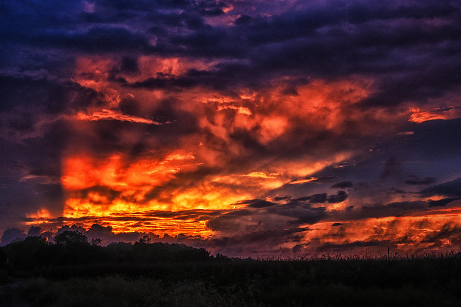Fire in the Sky over Georgetown Photograph by Bill Swartwout
