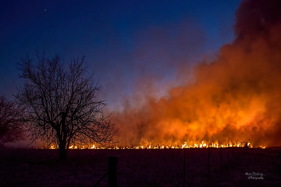 Fire on the plains Photograph by Steve Tredway Fine Art America