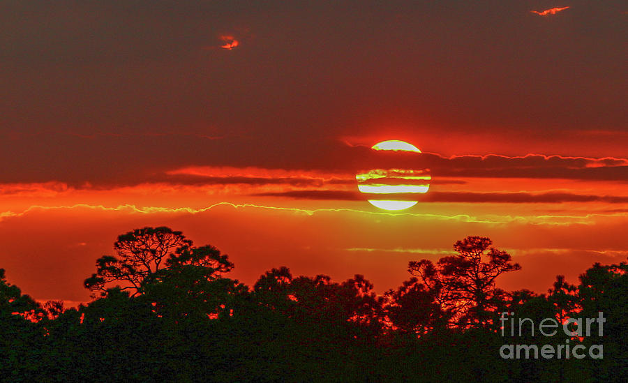 Fireball Sunset Photograph by Tom Claud