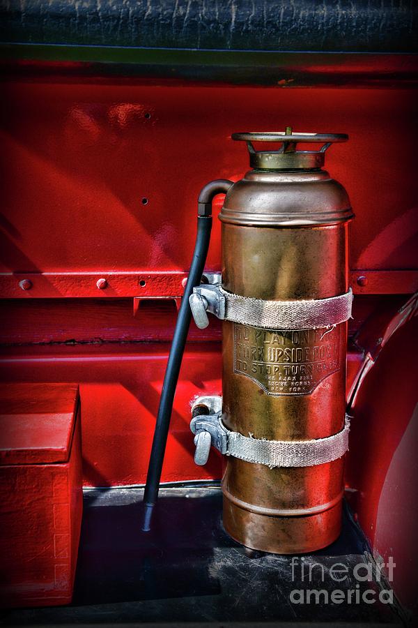 Fireman-Brass Fire Extinguisher Photograph by Paul Ward
