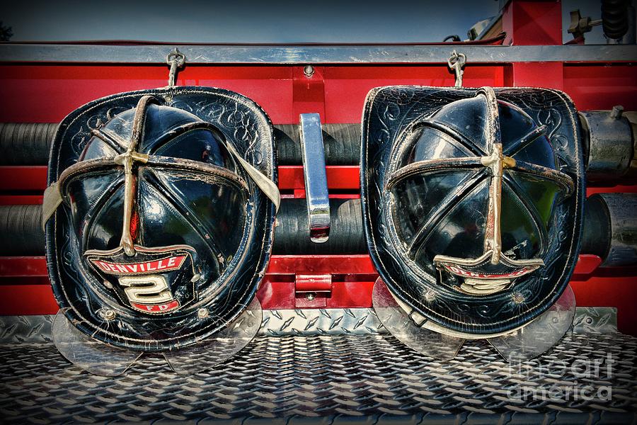 Fireman Helmets on the Truck Photograph by Paul Ward