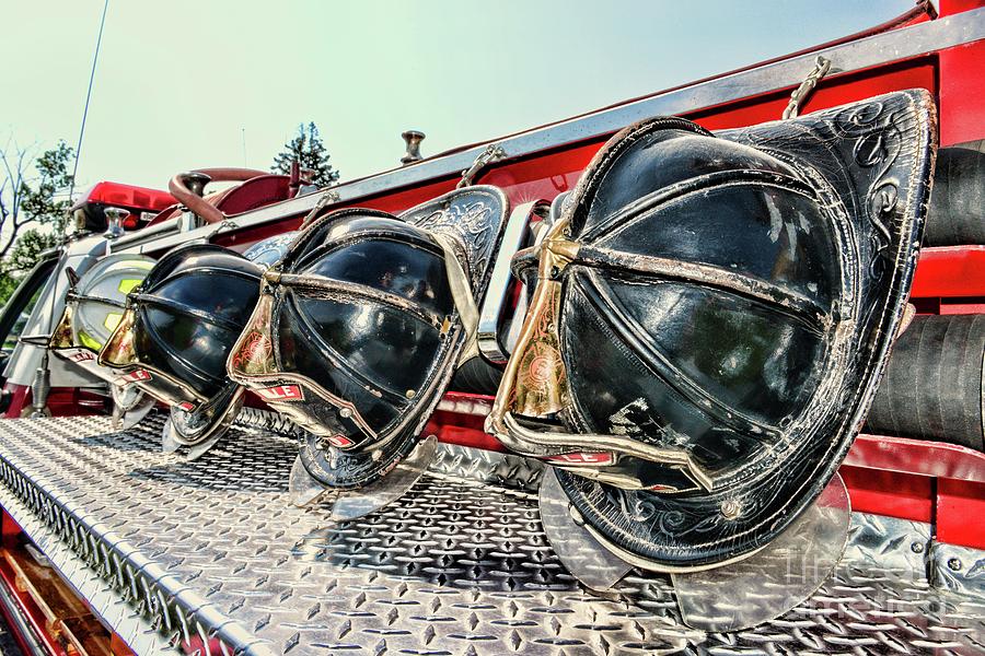 Fireman-Nice Helmets Photograph by Paul Ward