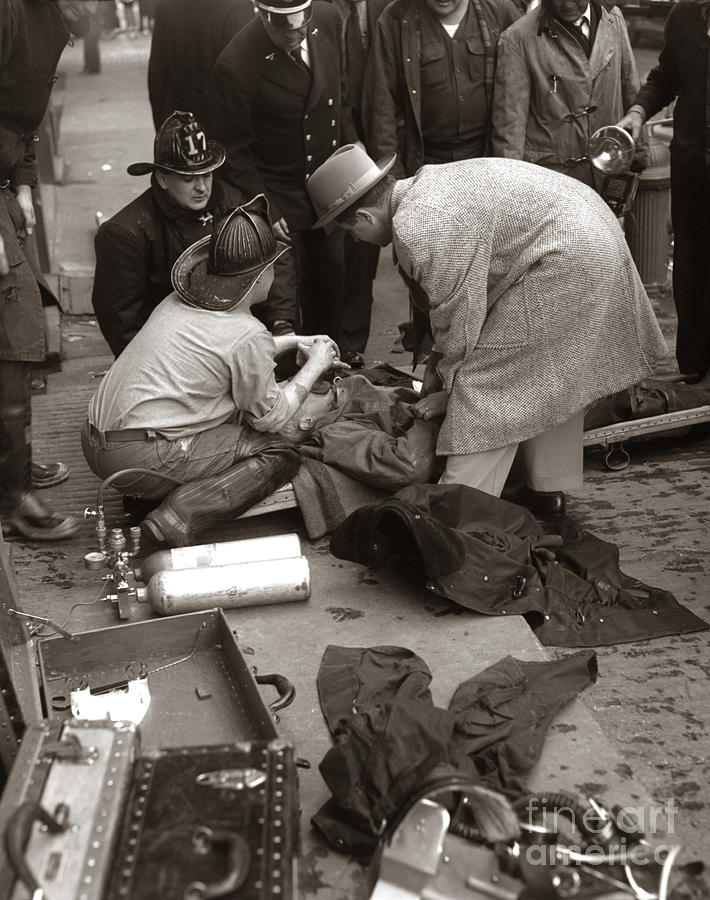 Firemen Aid Victim, C.1940-50s Photograph by H. Armstrong Roberts/ClassicStock