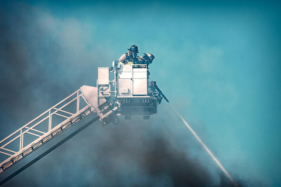 Firemen Dousing Flames  Photograph by Todd Klassy