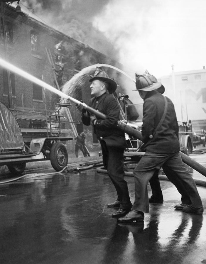Chicago Photograph - Firemen With Hose by Underwood Archives