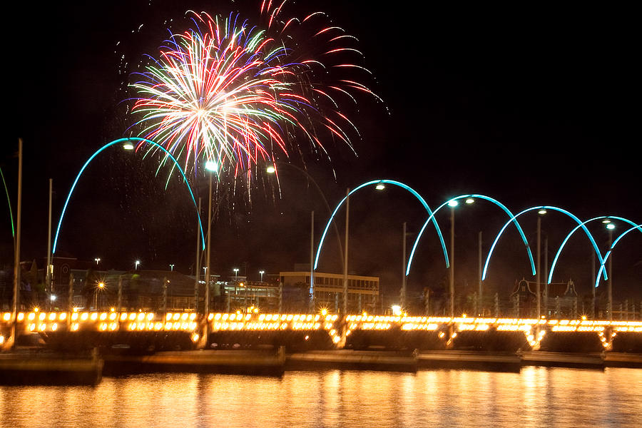 Fireworks over the floating bridge in Curacao Photograph by Gerth Jan Helmes Fine Art America
