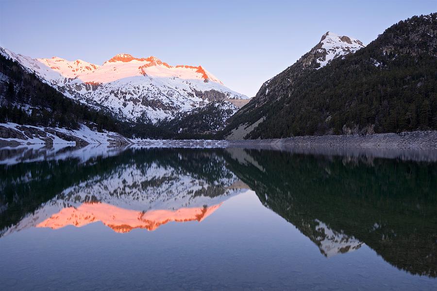 First light at Lac dOredon Photograph by Stephen Taylor