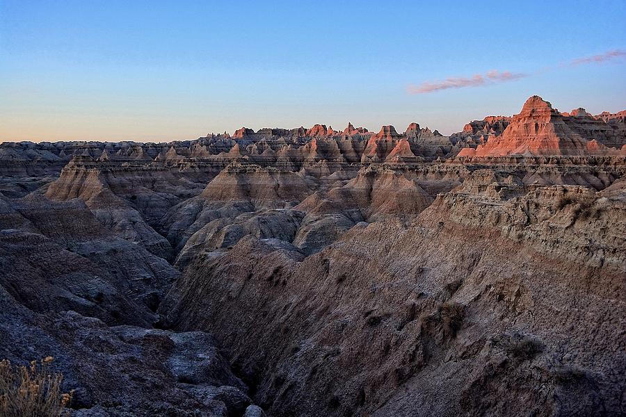 First light in the Badlands Photograph by Fiskr Larsen