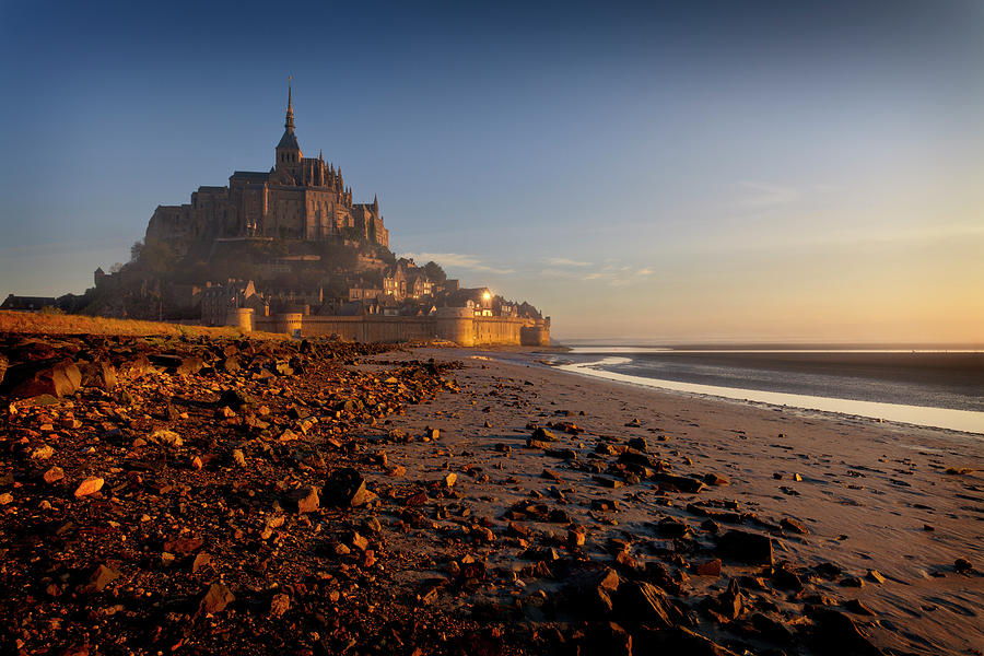 First light on the Mont St Michel Photograph by Dominique Dubied