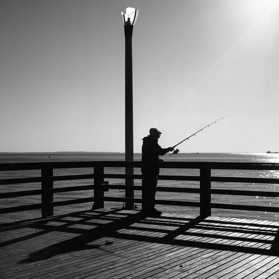 Fisherman at Coney Island Photograph by Stephen Russell Shilling