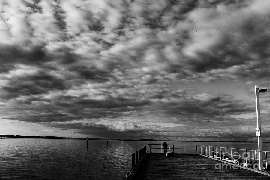 fisherman at the Stony  Point jetty 1 Photograph by Win Naing