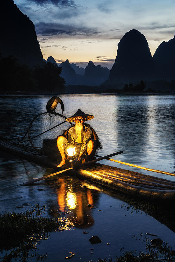 Mountain Photograph - Fisherman by the river by Aaron Choi