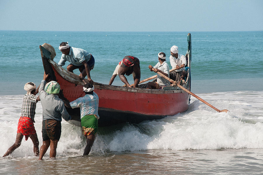 Fisherman Launching Boat, Goa, Horizontal, India. Photograph by Louis ...