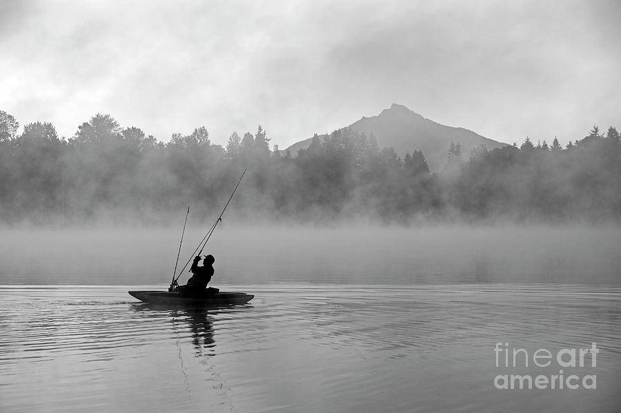 Fisherman on Lake Cassidy casting Fishing Line  Photograph by Jim Corwin