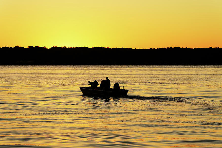 Nature Photograph - Fishermen Boating into a Golden Sunrise by Delmas Lehman