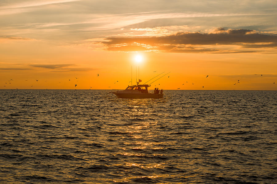 Fishing as the Sun Goes Down Photograph by Mark Rogers
