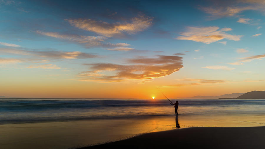 Fishing At Sunset Photograph by David Downs