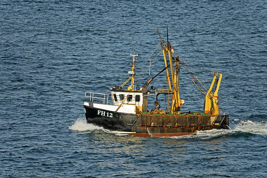 Fishing Boat FH12 off Pendennis Point Photograph by Rod Johnson