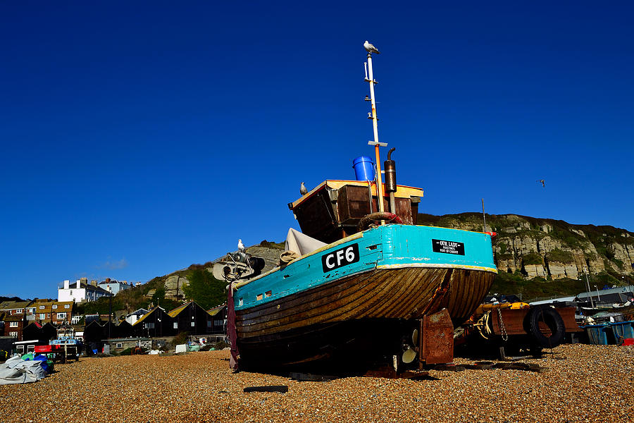 Fishing Boat on Hastings Beach Photograph by Bel Menpes