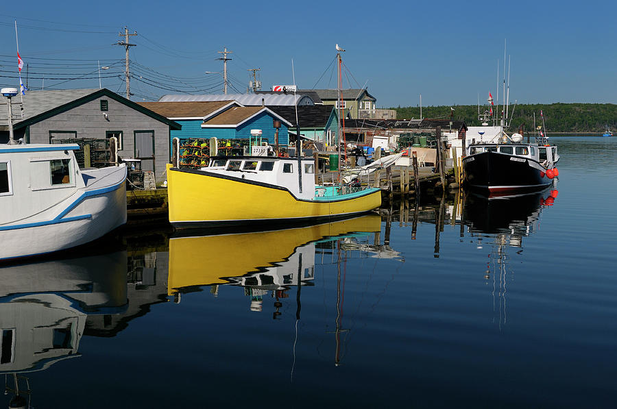 Fishing boats and lobster traps at Fishermans Cove Eastern Passa ...