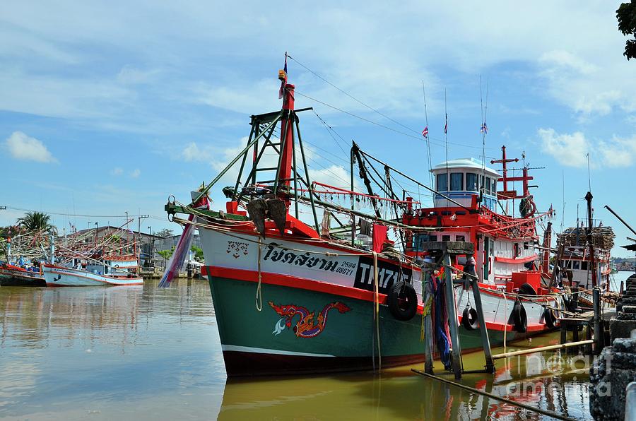 Fishing boats docked at fish harbor Pattani Thailand Photograph by Imran Ahmed