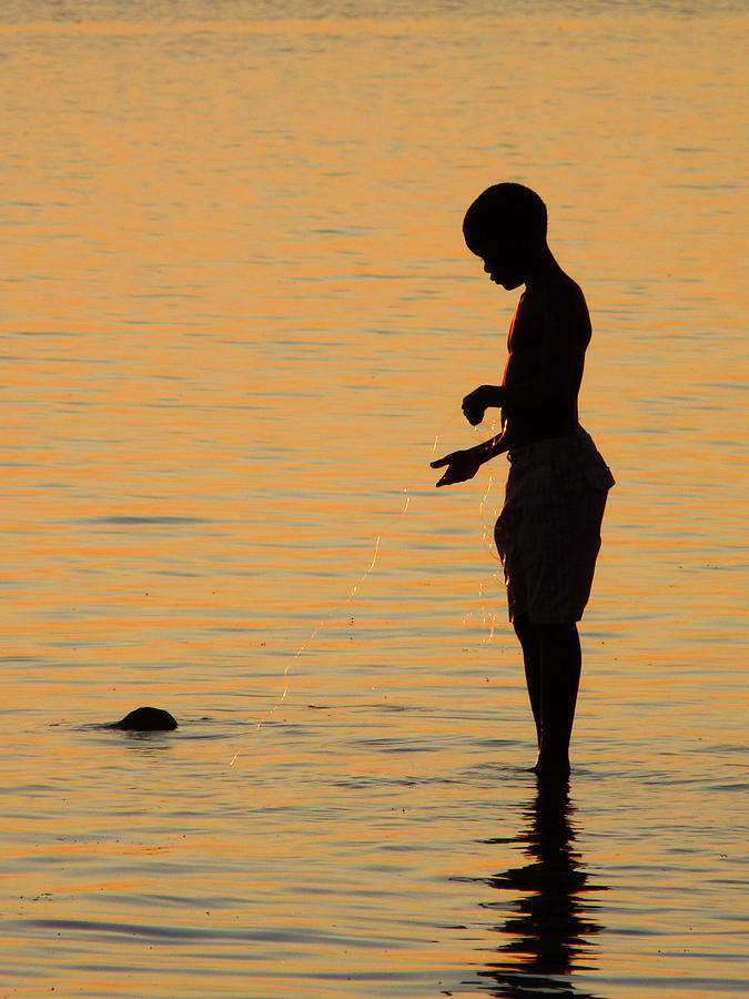 Fishing Boy At Sunset Photograph