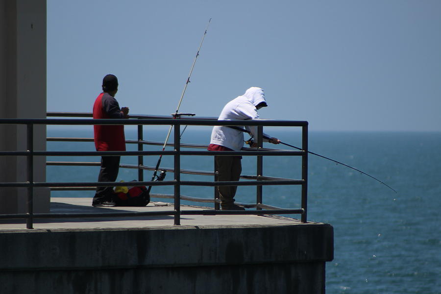 Fishing Off The Pier Photograph by Colleen Cornelius