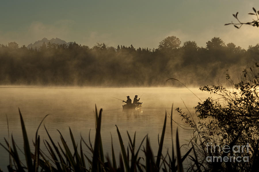 Fishing on lake cassidy Photograph by Jim Corwin