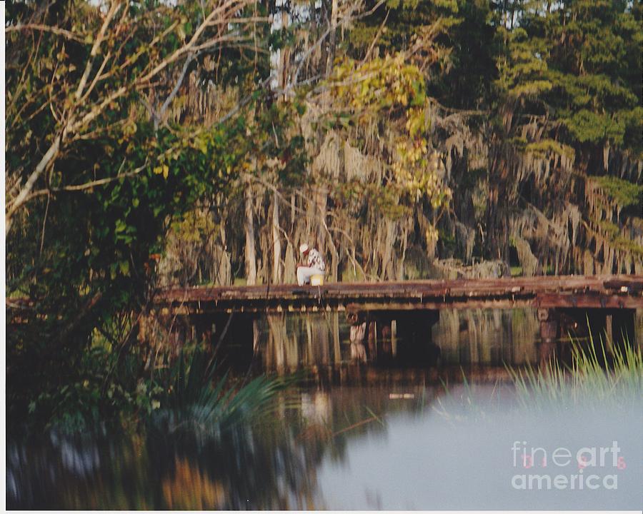 Nature Photograph - Fishing on the bridge by Michelle Powell