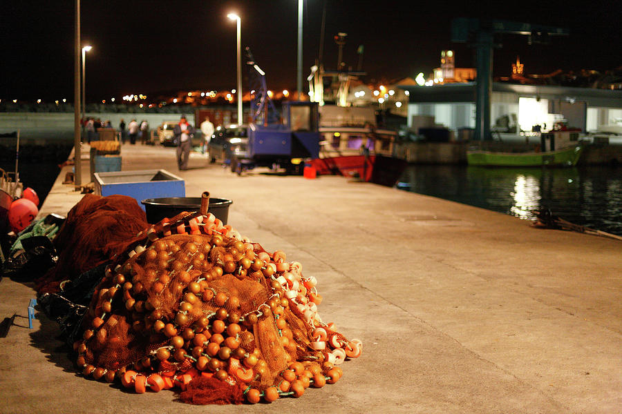 Fishing port at night Photograph by Gaspar Avila