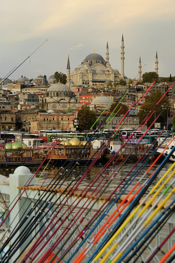 Byzantine Photograph - Fishing rods for sale on Galata Bridge over Golden Horn with Sul by Reimar Gaertner