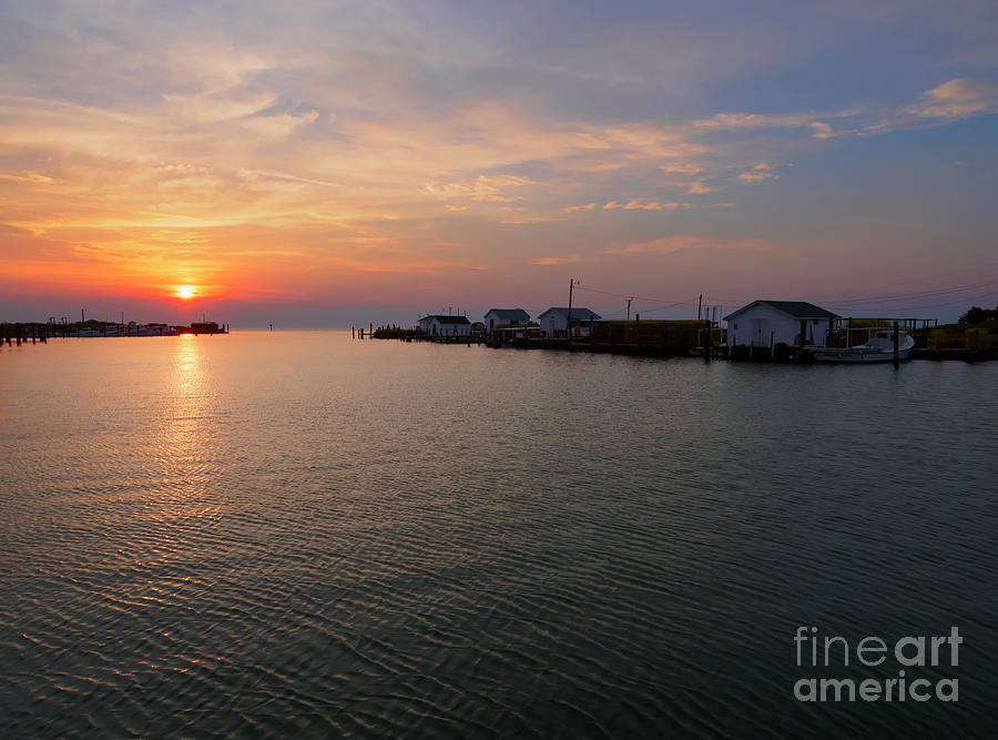Sunset Photograph - Fishing shanties at sunset on Tangier Island in Chesapeake Bay by Louise Heusinkveld