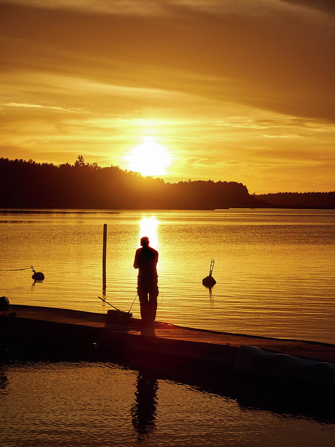 Fishing. Sunset at Raumanmeri Photograph by Jouko Lehto