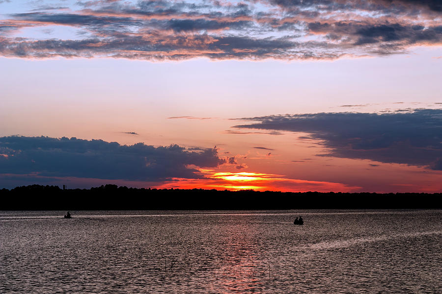 Fishing sunset Photograph by Doug Long