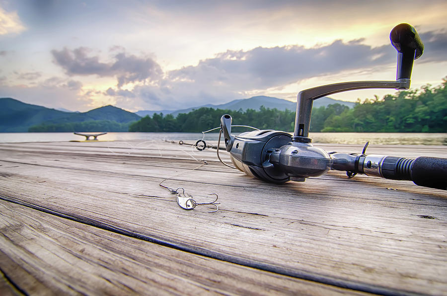 Fishing Tackle On A Wooden Float With Mountain Background In Nc Photograph by Alex Grichenko