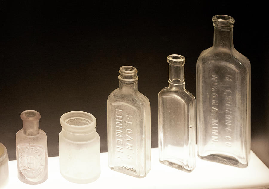 Five Old Glass Bottles Photograph by Marilyn Hunt