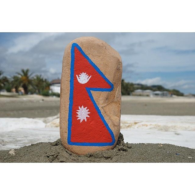 Flag Photograph - Flag Of Nepal On A Stone, The Worlds by Adriano La Naia