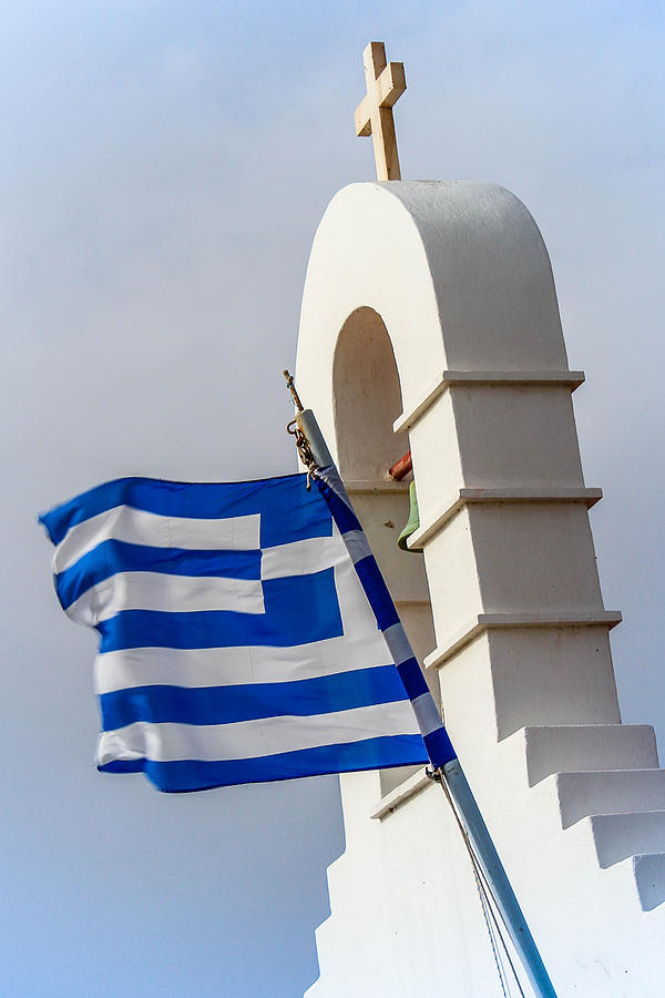 Flag Over Mykonos Photograph by Bryan Moore