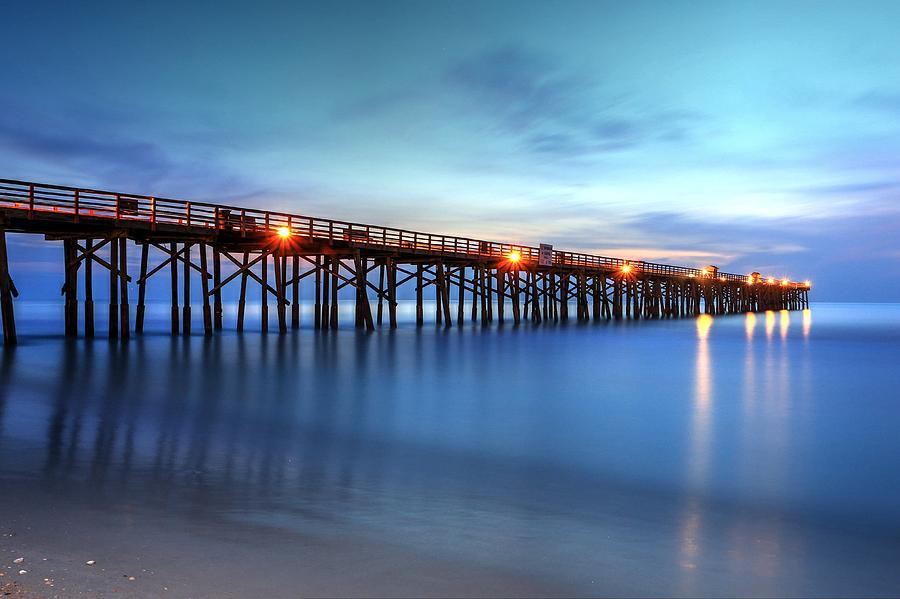 Flagler Beach Piers Early Morning Light  Photograph by Carol Montoya