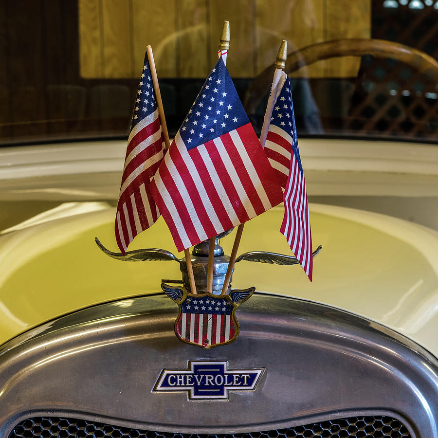 Flags And Chevy Photograph by Paul Freidlund